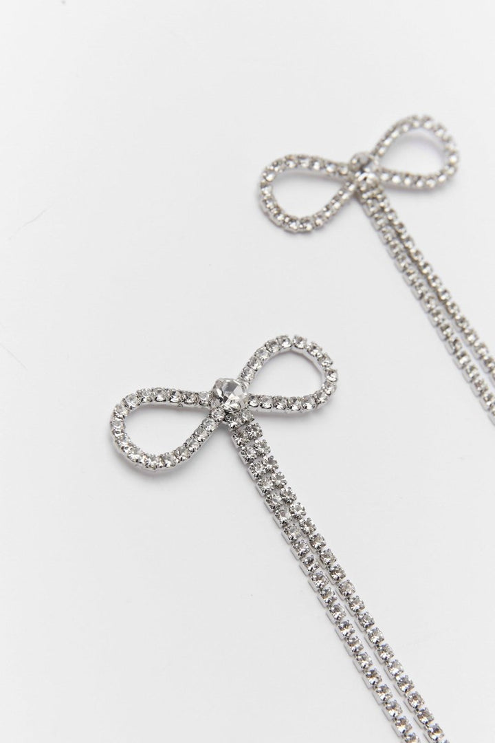 Diamante Bowknot Quasten-Ohrringe - KYMA - In der Handfläche