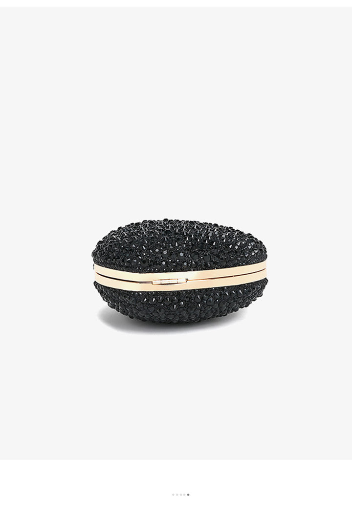 Seite der Clutch, die das Herzdesign zeigt - KYMA