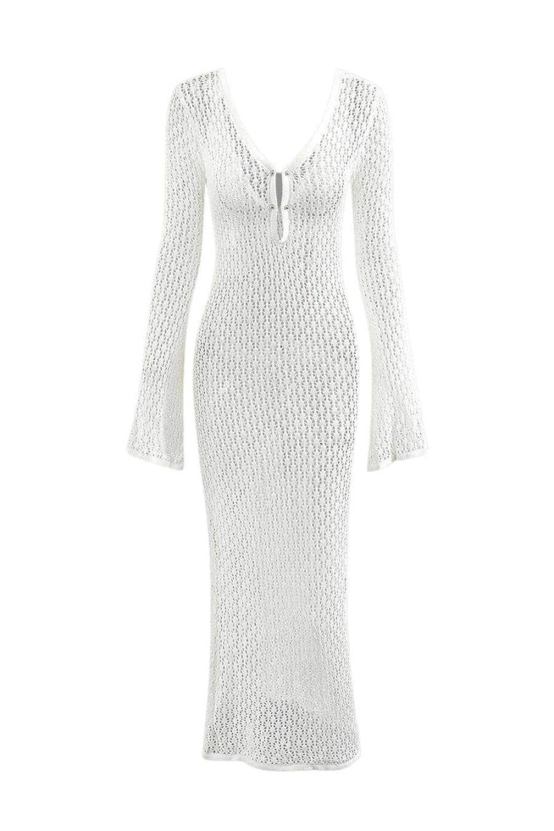 Das Kleid wird für einen tropischen Anlass gestylt - KYMA